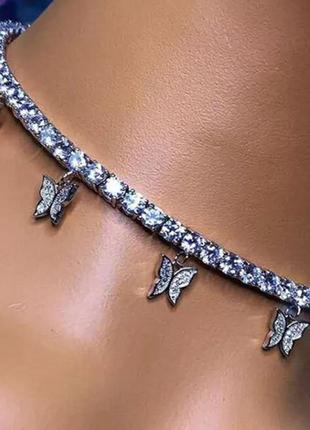 Цепочка кулон ожерелье бабочки с стразами серебряный цвет1 фото