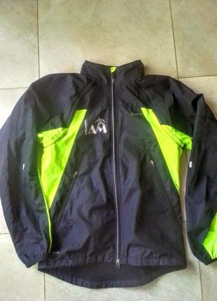 Спортивна куртка-вітровка  nike storm fit. , професійна  .розмір  46 (s) унісекс.1 фото