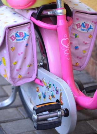Дитячий велосипед для дівчинки puky babyborn 16" +шолом+сумки3 фото