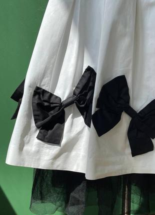 Винтажная белая меди юбка с акцентными черными бантами3 фото