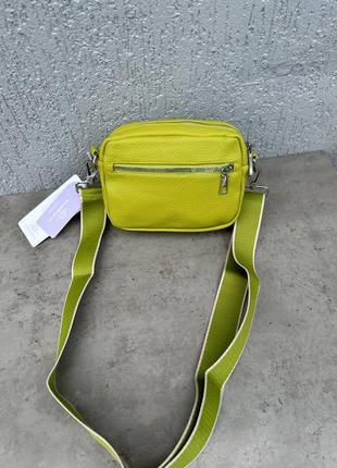 Салатовая сумочка кросс боди+длинный регулируемый текстильный ремешок.2 фото