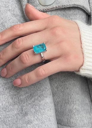 Серебряное новое кольцо с голубыми камнями4 фото
