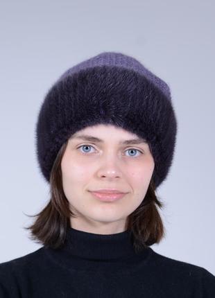 В'язана жіноча норкова шапка з помпоном.1 фото