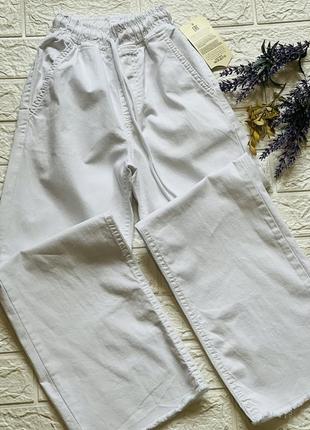 Белые штаны для девушки4 фото