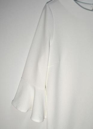 Стильная белая блуза с расклешенным рукавом next2 фото