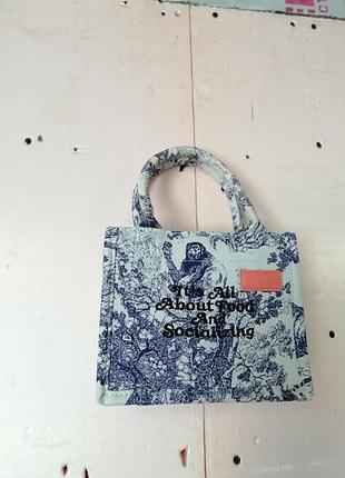 Маленька каркасна сумочка