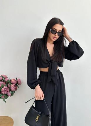 Костюм брючный топ свободный спереди на завязке рукав длинный пышный на резинке брюки широкие талия на резинке боковые карманы ткань американский креп