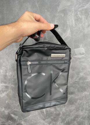 Мужская сумка calvin klein черная барсетка / сумка на плечо7 фото