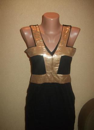Эластичное платье с золотистыми паетками2 фото