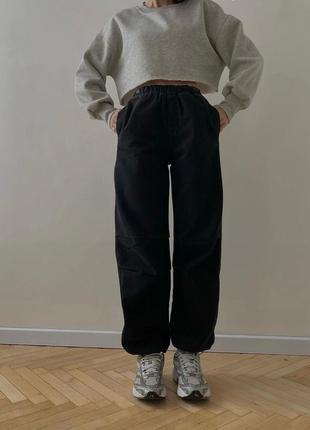 Трендовые штаны с затяжкой по низу1 фото