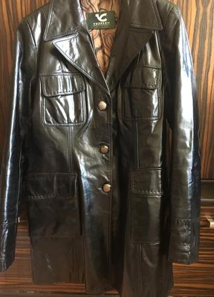 Шкіряна куртка. натуральна шкіра. стан нової речі.48 р.