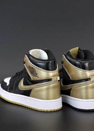 Женские кроссовки nike air jordan 1 high black gold 37-383 фото