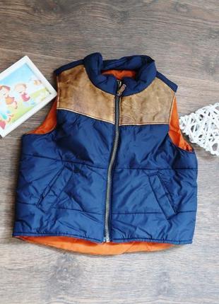 Відмінна зручна і тепла жилетка