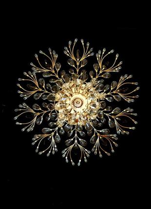 Крупная хрустальная люстра под потолок