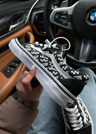 Текстильные кеды vans. унисекс. цвет черный с белыми надписями.4 фото