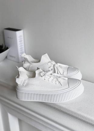 Білі текстильні кросівки в сіточку,  на шнурівку1 фото