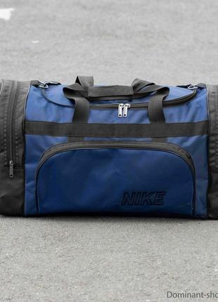 Якісна дорожня спортивна сумка nike biz синя для тренувань та переїздів на 60 літрів містка7 фото