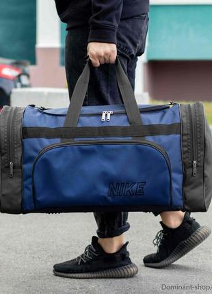 Якісна дорожня спортивна сумка nike biz синя для тренувань та переїздів на 60 літрів містка3 фото