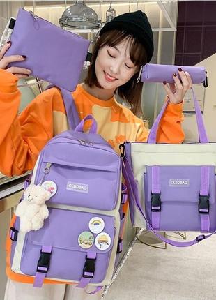 Детский школьный рюкзак набором 5 в 1 брелок пенал шопер значки в фиолетовом цвете1 фото