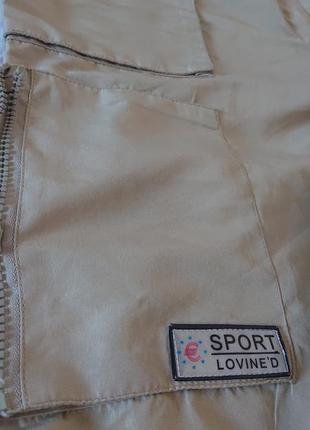 Фирменные лёгкие спортивные штаны карманы5 фото