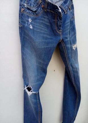 Рваные джинсы3 фото