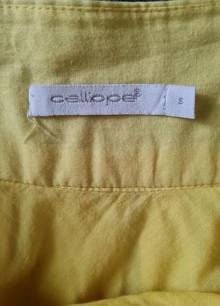 Жёлтая пышная юбка в складку8 фото
