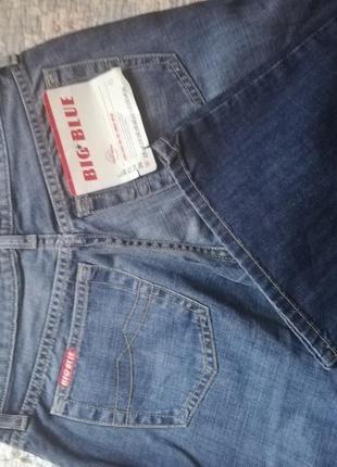 Джинсы клеш