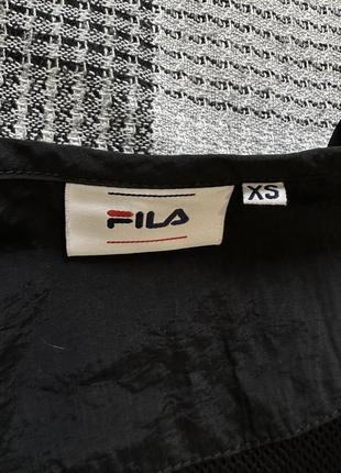Fila короткая жилетка с карманами с рефлективным логотипом на спине7 фото