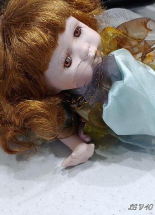 Шикарная фарфоровая кукла, есть клеймо5 фото