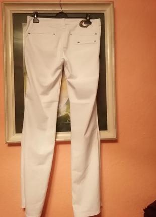 Білі  широкі джинси ґ-12 фото