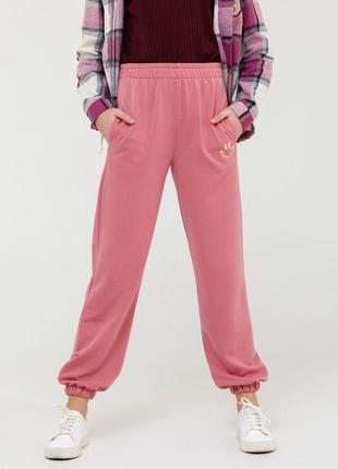 Рожеві трикотажні джоггери з вишивкою