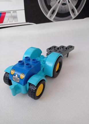 Lego duplo. трактор блакитний із культиватором.