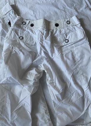 Белые брюки внизу на стяжках6 фото