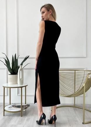 Черное трикотажное платье без рукавов3 фото