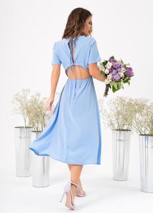 Голубое платье с разрезом и вырезом на спине2 фото