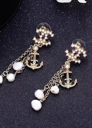 Красиві довгі сережки