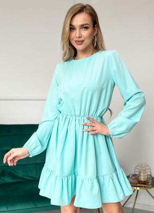 Голубое приталенное платье с воланом1 фото