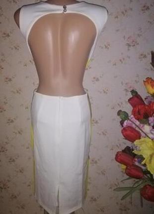 Шикарное стильное платье - миди с открытой спиной. размер "s".4 фото