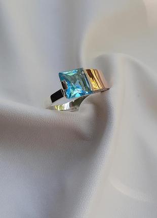 🫧 18.5 размер кольцо серебро с золотом фианит голубой2 фото