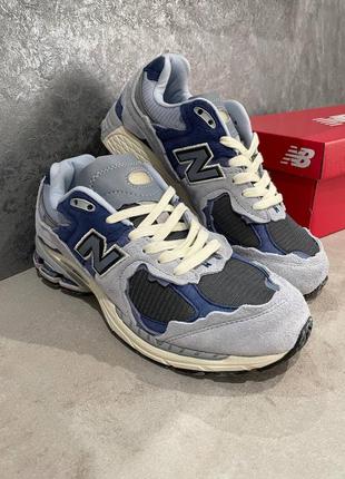 Мужские замшевые кроссовки new balance 2002r. цвет серый с синим4 фото