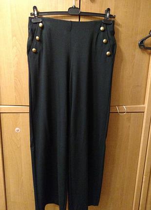 Штани широкі з високою талією в новому стані