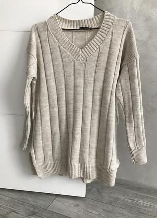 Стильный удлиненный свитер