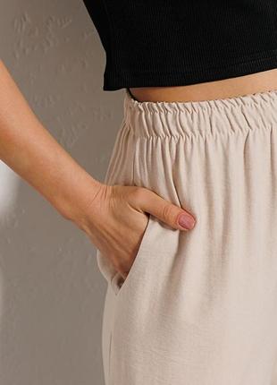 Женские легкие летние брюки с разрезами внизу разных цветов6 фото