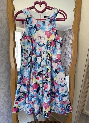 Яскрава різнокольорові літня сукня сарафан дзвоник з квітковим принтом з квітами в квіти блакитна рожева жовта4 фото