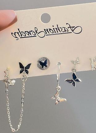 Набір сережок сріблясті трендові сережки кульчики кафп з метеликом сережки на ланцюжку асиметричні сережки з метеликами4 фото