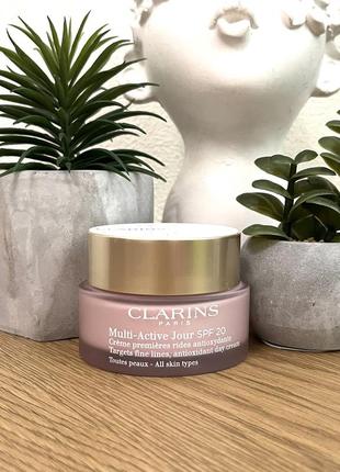 Оригинальный clarins multi-active day cream spf 20 для all skin types дневной крем для любого типа кожи оригинал дневной крем1 фото