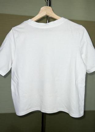 Базові білі бавовняні футболки7 фото
