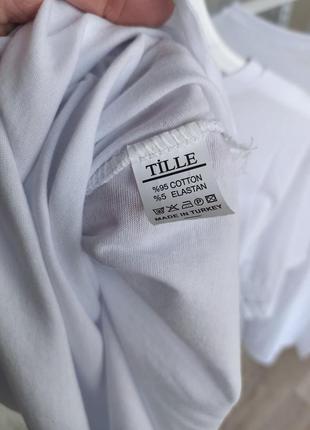 Тоненька біла футболка туніка із розрізами5 фото