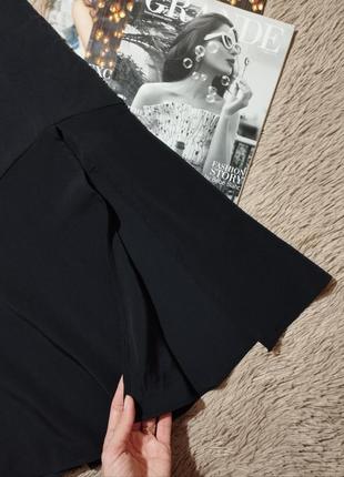 Крутая черная юбка-миди с разрезом4 фото