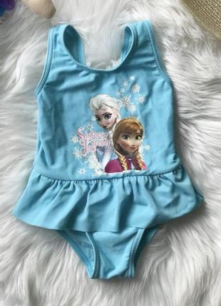 Класний ніжний  купальник frozen від george на крихітку 9-12 міс., зріст  74-80 см.